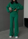 Фото Костюм жіночий у рубчик зі светром оверсайз та штанами-палаццо зелений